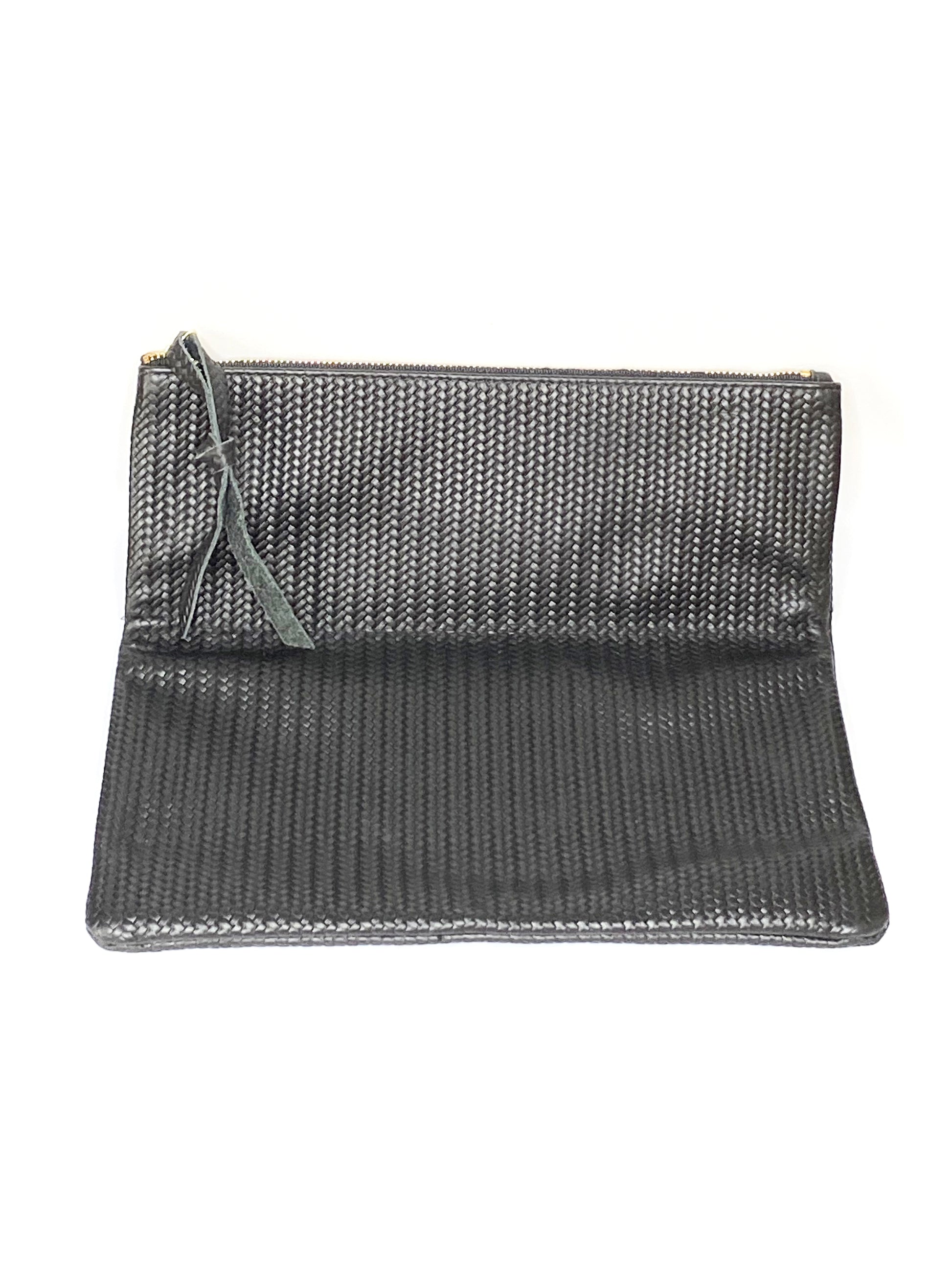 black leather clutch open